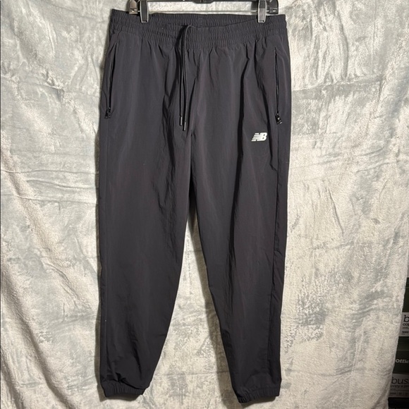 New Balance Black Sweatpants men’s Large elastic Cuffs Waistband waterproof - Picture 1 of 13